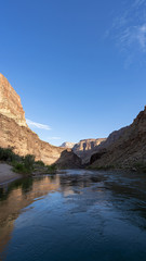 Fototapeta na wymiar Colorado River runs through Grand Canyon providing exciting whitewater rafting and incredible views along the way. Numerous side canyons can be hiked, often to beautiful waterfalls.