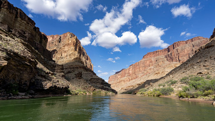 Colorado River runs through Grand Canyon providing exciting whitewater rafting and incredible views along the way. Numerous side canyons can be hiked, often to beautiful waterfalls.