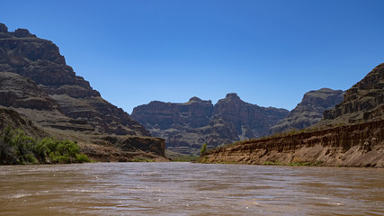 Grand Wash Cliffs. Colorado River runs through Grand Canyon providing exciting whitewater rafting and incredible views along the way. Numerous side canyons can be hiked, often to beautiful waterfalls.