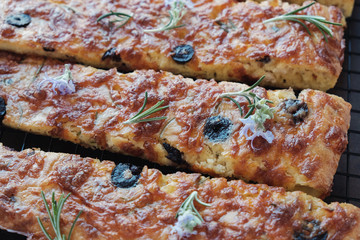 Obraz na płótnie Canvas Low carb keto almond cheese bread, olive,garlic and rosemary focaccia