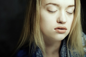 young woman with beautiful blue eyes 