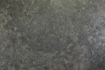 Bare plaster walls or Cement wall.