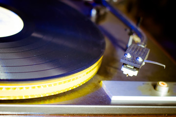 Close up at vintage gramophone. playing old song,Vintage record player with vinyl disc