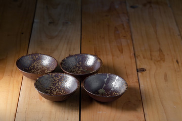 Fototapeta na wymiar Ceramic Tableware Set on a wooden background