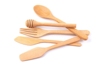 Set of wooden cutlery in Wicker baskets isolated on a white background