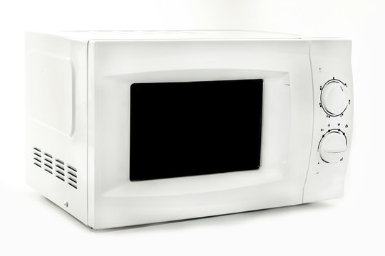 Microwave oven close up isolated on white background