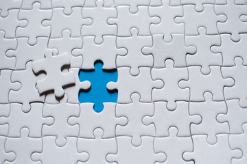 Fototapeta premium point holding connecting red and White ,Business connection,Success and strategy concept one finger , point pieces of jigsaw puzzle,Teamwork concept