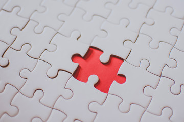 Selective focus of pieces puzzle jigsaw, puzzle background.
