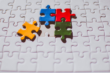 fjigsaw puzzle couple empty copy space business, education concept. red, green, blue, yellow