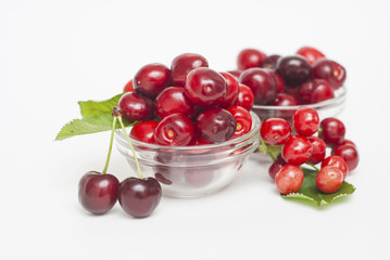 Cherries. Cherry. Cherries in color bowl and kitchen napkin. Red cherry. Fresh cherries. Cherry on white background. healthy food concept