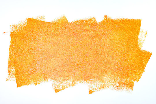 orange paint roller strokes on white wall background