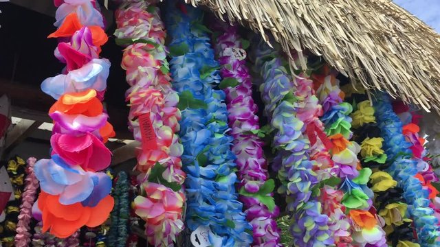 Polynesian Lei garland of flowers in Rarotonga Cook Islands. A lei can be given to someone for: love, honour, or friendship for another person.