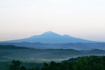Fototapeta na wymiar Amazing view landscape with mountain ranks in blue sky