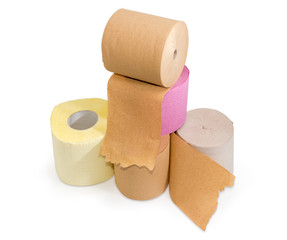 Rolls of various toilet paper different colors on white background