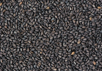 Close up black sesame seeds as background