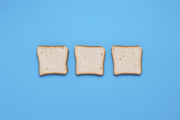 Three Toasts on a blue background.