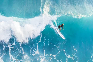 Tuinposter Surfer on the crest of the wave, top view © watman