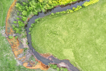Top view of the bend of a narrow river
