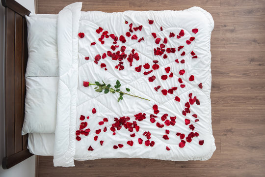 The Bed With A Rose Petals. View From Above