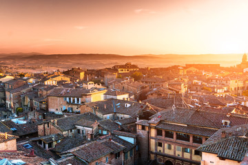 Fototapeta na wymiar Top view of Siena at sunset, Italy