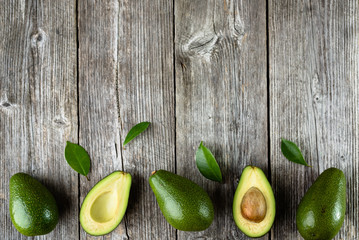 Ripe avocado on wooden background