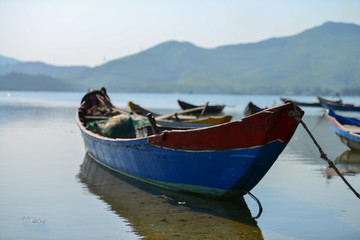 Naklejka na ściany i meble The boat in the lagoon. Vietnam Southeast Asia
