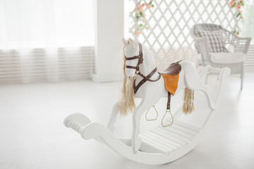 white horse in child  room