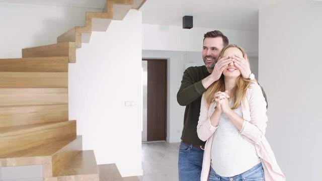 Young couple at new apartment