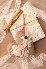 details of wedding decor, pillow heart for rings, veil, invitation for a holiday