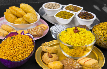 Indian Group of Diwali and Holi Celebration Food Namkeen, Chivda, Chiwada, Karanji, Namkin, Nimco, Mixture Namkeen, Masala Chana, Gujiya, Chana Chor Garam, Cookies, Biscuits or Mouth Freshner
