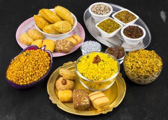 Indian Group of Diwali and Holi Celebration Food Namkeen, Chivda, Chiwada, Karanji, Namkin, Nimco, Mixture Namkeen, Masala Chana, Gujiya, Chana Chor Garam, Cookies, Biscuits or Mouth Freshner