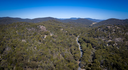 Fototapeta premium Aerial drone view over wineries and granite rock in Stanthorpe, Australia