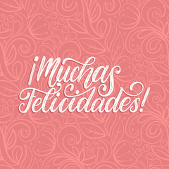 Muchas Felicidades translated from Spanish handwritten phrase Congratulations on pink background.Vector illustration.