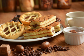 assorted chocolate foods in the wooden table