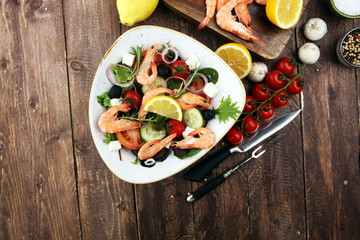 tasty meal with fresh and healthy prawn salad and vegetables. Prawns Langostino Austral.