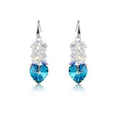 Pair of sapphire earrings isolated on white