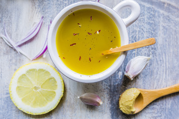 Ingredients for preparing a French salad dressing.