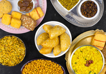 Indian Group of Diwali and Holi Celebration Food Namkeen, Chivda, Chiwada, Karanji, Namkin, Nimco, Mixture Namkeen, Masala Chana, Gujiya, Chana Chor Garam, Cookies, Biscuits or Mouth Freshner