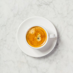 Coffee on white marble background