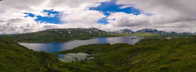 Naklejka na ściany i meble Panoramic view to Hardangervidda plateau and Kjelavatn lake in Norway