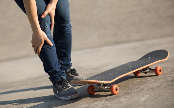 skateboarder got spirts injury skateboarding on skatepark