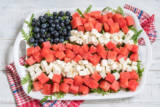Patriotic American flag salad with blueberry, watermelon and feta