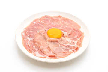 fresh sliced pork raw with egg for cooking or making shabu shabu and sukiyaki