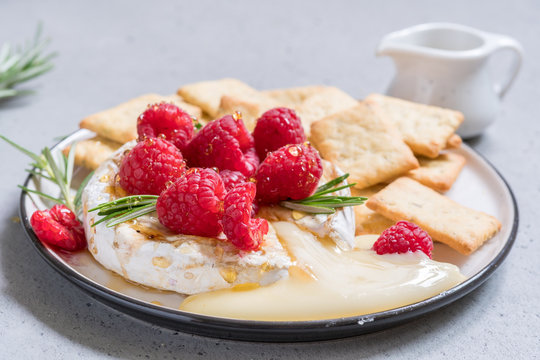 Baked Camembert cheese with raspberry