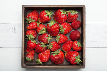 Red fresh strawberries, diet dessert, freshness. Berry background.