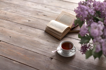 Bunch of lilac, books and teacup./Flower, Tea - Hot Drink, Picture Frame, Lilac - Flower, Tea Cup