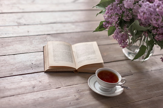 Bunch of lilac, books and teacup./Flower, Tea - Hot Drink, Picture Frame, Lilac - Flower, Tea Cup