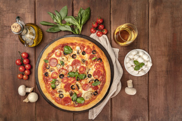 Pepperoni pizza with white wine, ingredients, and place for text