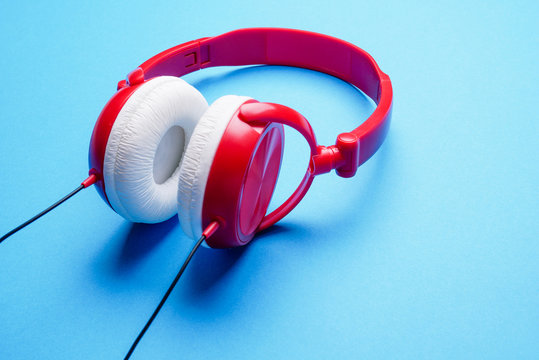 Picture of red with white headphones for music close-up