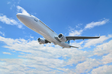 Fototapeta premium Samolot pasażerski w chmurach.